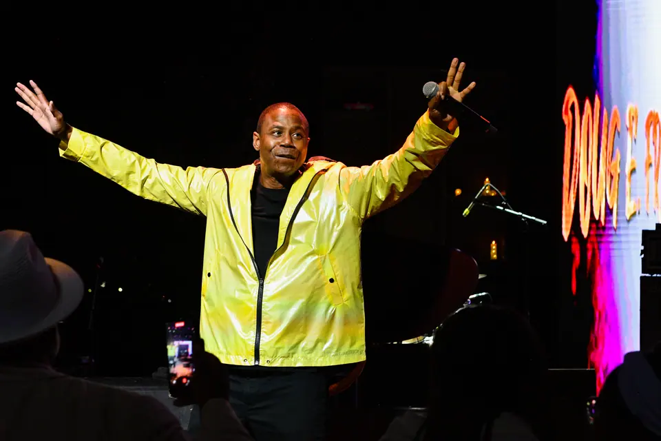 Doug E. Fresh with arms outstretched